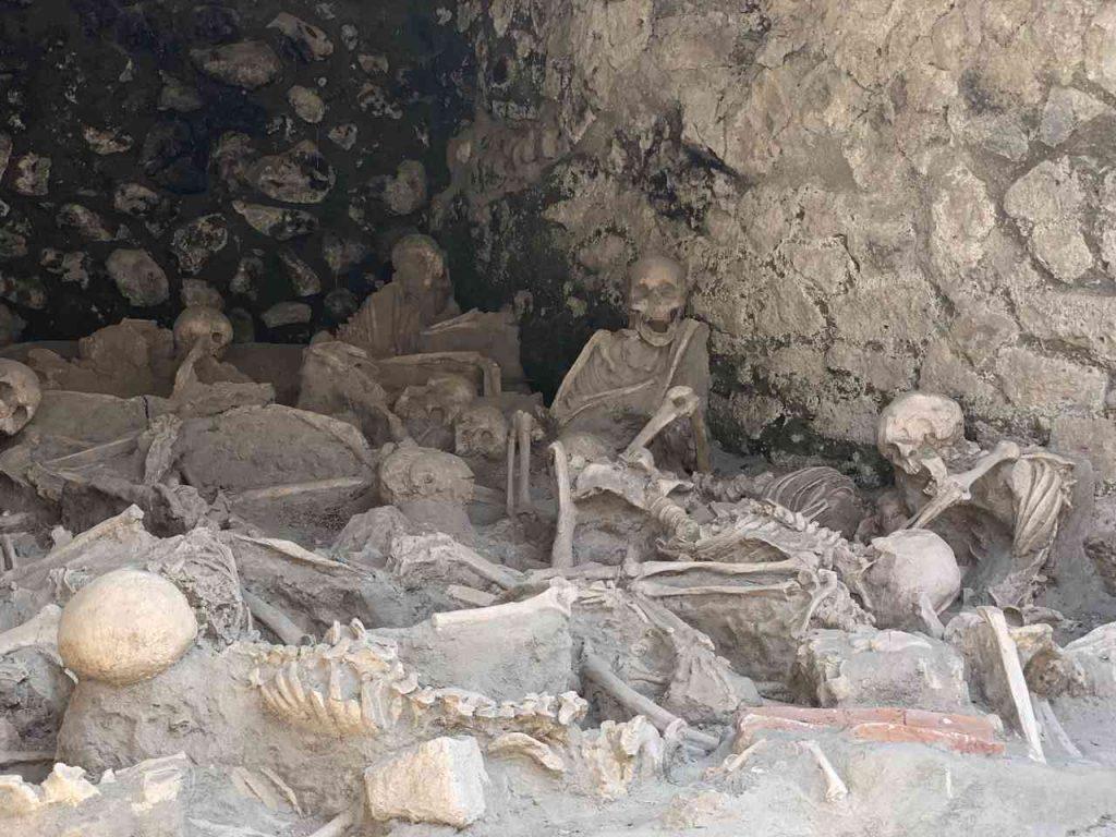 skeletons of people who were trying to escape the volcanic eruption, at the docks in Herculaneum, Italy
