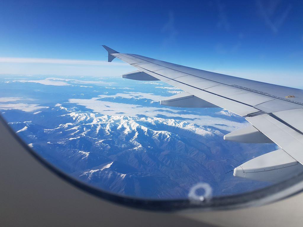 View of mountains from airplane window