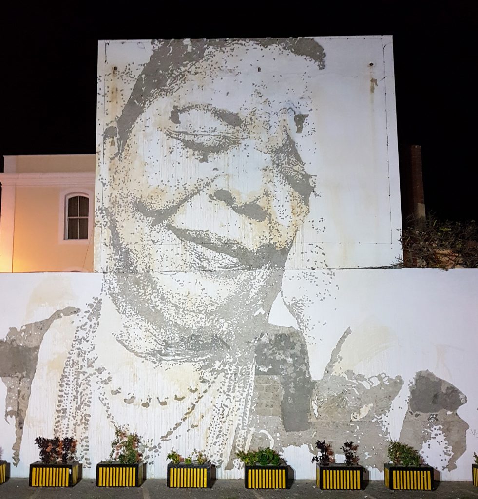 Portrait of singer Cesaria Evora on a Mindelo building wall