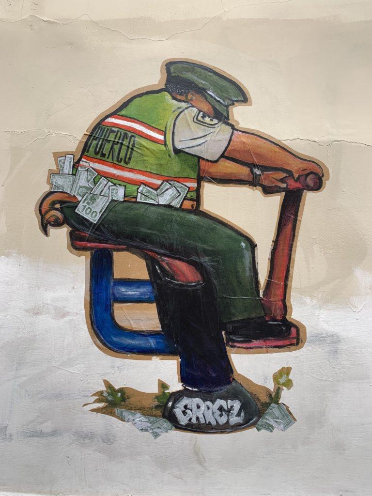 Street art about corrupt police - Cuenca Ecuador