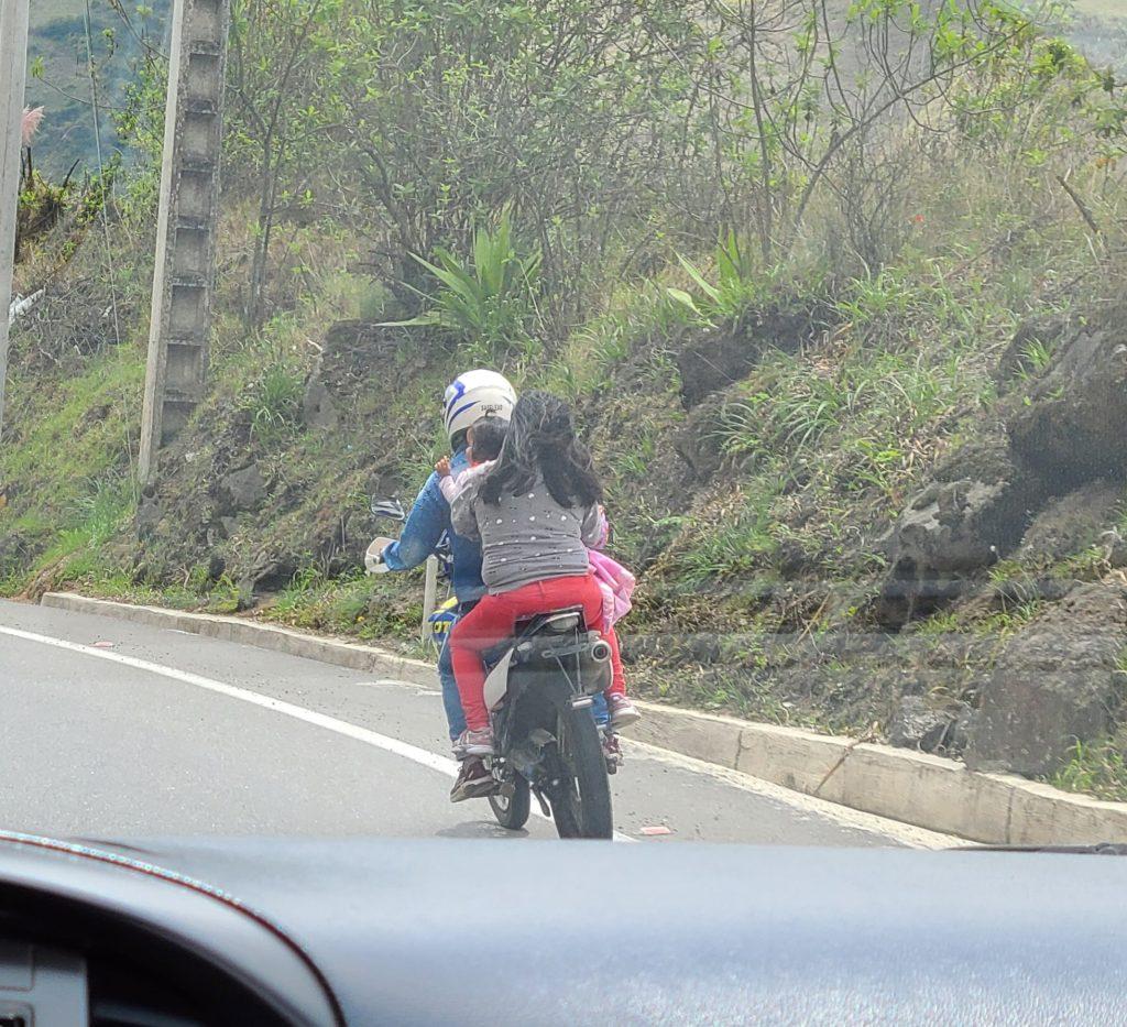 Baby on board! (baby riding on motorcycle with parents)