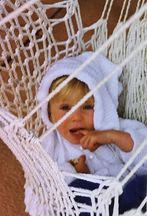 My daughter, as a baby, hanging in a hammock. I'm pleased to report she did not break her skull, despite her best toddler efforts. 