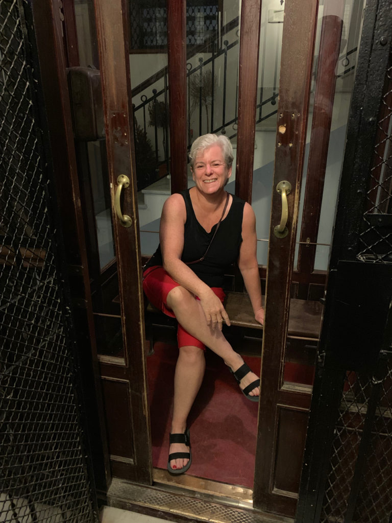 Tema in the tiny elevator at Santa Caterina B&B in Naples, Italy