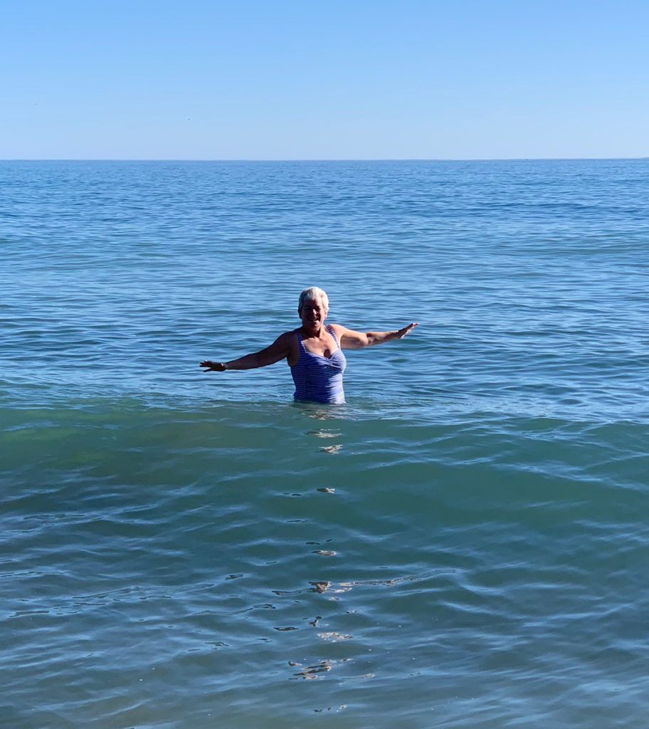 Taking a December dip in the sea under the sunny skies of Malaga in southern Spain.