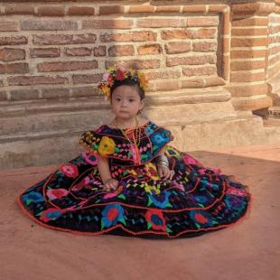Toddler in traditional dress of Chiapa de Corzo, Mexico